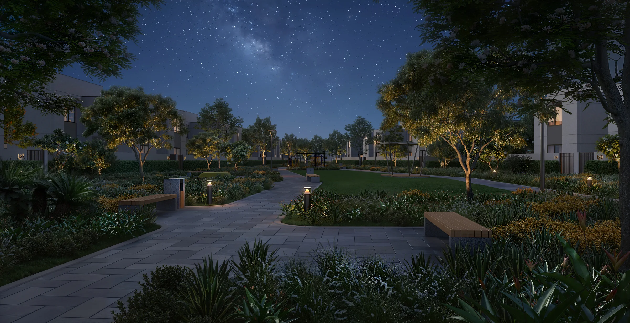 Night-time artist impression of a landscaped pedestrian park at Al Ghadeer Gardens