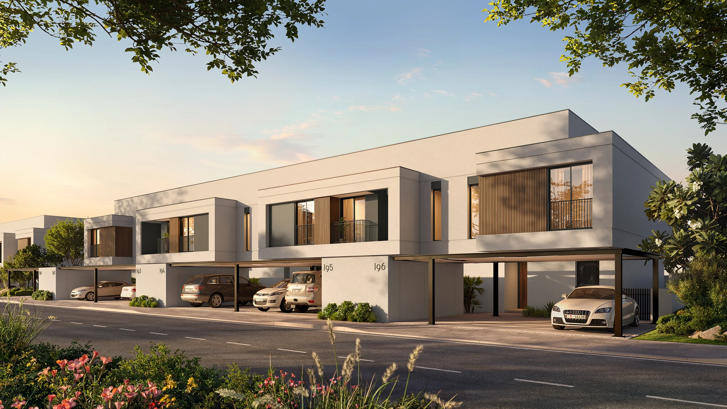 Unstaged artist impression of an Al Ghadeer Gardens townhouse streetscape
